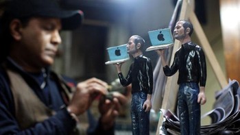 Patung yang dibuat untuk mengenang Steve Jobs. Foto: Getty Images