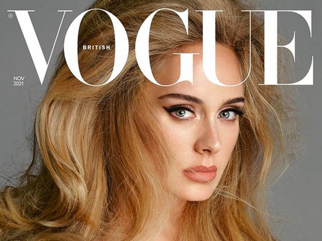 Vogue Inggris juga merilis cover yang berbeda. Sampul versi berbeda menampilkan Adele bergaya dengan dress kuning Vivieene Westwood yang memiliki korset ketat sehingga mempertegas keseksiannya. (Foto: Instagram/@britishvogue)