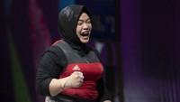 Lifter putri Jawa Tengah Diah Ayu P berhasil meraih medali emas dengan total angkatan 215 Kg.  