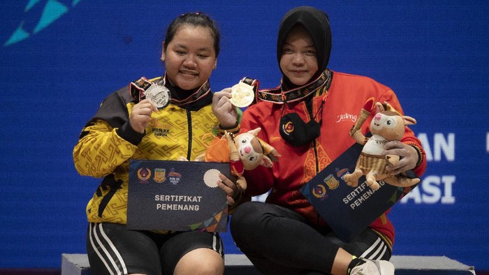 Jateng Tambah Medali Emas dari Angkat Besi 76 Kg Putri di PON Papua Lifter putri Jawa Tengah Diah Ayu P raih medali emas dari angkat besi pada kelas 76 kg. Raihan itu menambah medali yang telah dikumpulkan Jateng di PON XX Papua