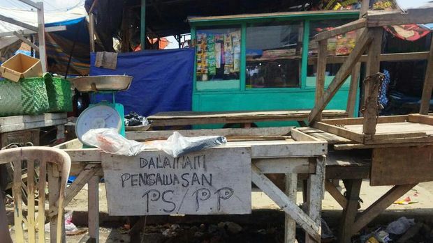 TKP pemukulan pedangan wanita di Sumut oleh preman, Pasar Gambir, Tembung, Deli Serdang, Sumut,  Minggu (10/10/2021).