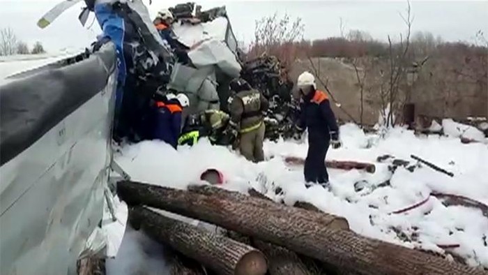 This photo provided by the Russian Emergency Situations Ministry press service shows the L-410, a Czech-made twin-engine turboprop, crashed near the town of Menzelinsk, about 960 kilometers (600 miles) east of Moscow, Russia, Sunday, Oct. 10, 2021. A plane carrying skydivers crashed Sunday shortly after takeoff in central Russia, reportedly killing 15 of the 22 people aboard. The L-410, a Czech-made twin-engine turboprop, crashed near Menzelinsk, about 960 kilometers (600 miles) east of Moscow (Ministry of Emergency Situations press service via AP)