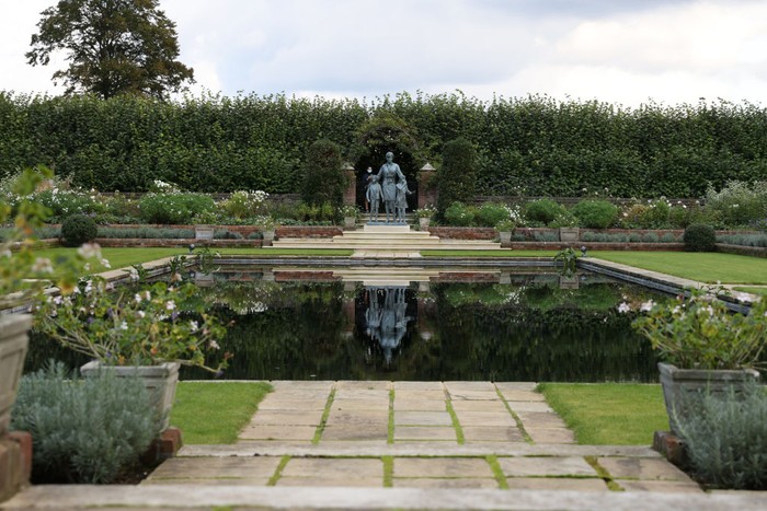 LONDON, ENGLAND - OCTOBER 10: The new Princess Diana statue in the Sunken Garden at Kensington Palace on October 10, 2021 in London, England. The statue of Diana, Princess of Wales, was unveiled at a pared-down ceremony in July, but a larger reception with her family and friends, including Sir Elton John, was rescheduled until later this month. (Photo by Hollie Adams/Getty Images)