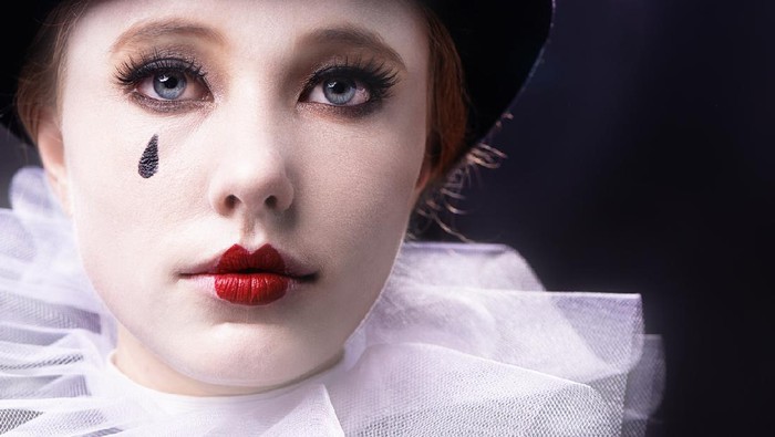 523149219 Studio shot of a female mime