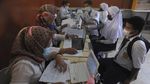 Kebut Vaksinasi Pelajar dan Razia Kartu Vaksin