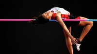Atlet lompat tinggi putri Bali Ni Made Eppi bertanding pada final lompat tinggi putri PON Papua di Stadion Atletik Mimika Sport Centre, Kabupaten Mimika, Papua, Rabu (13/10/2021).