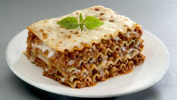 Traditional Italian pasta, lasagna is made with minced beef bolognese sauce with tomato, basil, and Mozzarella cheese.