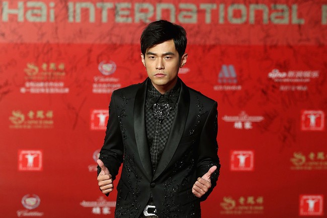 SHANGHAI, CHINA - JUNE 15:  Taiwanese singer, actor and director Jay Chou arrives at the opening ceremony of the 16th Shanghai International Film Festival at Shanghai Culture Square on June 15, 2013 in Shanghai, China.  (Photo by Feng Li/Getty Images)