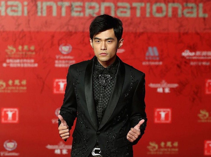 SHANGHAI, CHINA - JUNE 15:  Taiwanese singer, actor and director Jay Chou arrives at the opening ceremony of the 16th Shanghai International Film Festival at Shanghai Culture Square on June 15, 2013 in Shanghai, China.  (Photo by Feng Li/Getty Images)