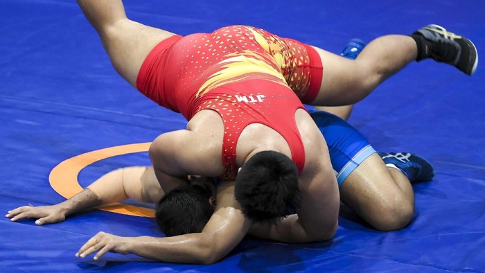 Melihat Kuncian Pegulat Papang Ramadhani yang Berujung Emas Pegulat Papang Ramadhani mempersembahkan medali emas untuk Kalimantan Timur. Papang mampu mengalahkan semua lawannya di duel 130kg gaya greco PON XX Papua.
