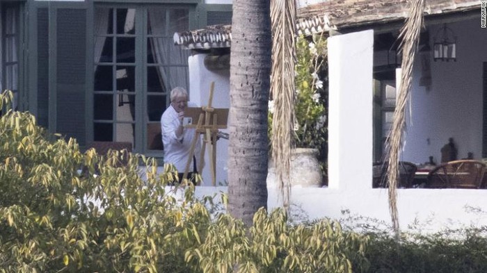 UK Prime Minister Boris Johnson was apparently photographed painting while on holiday in Spain. (Mirrorpix via CNN)