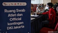 Petugas memeriksa kesehatan para atlet kontingen Jakarta yang baru kembali dari gelaran PON Papua di Hotel Grand Cempaka Business, Cempaka Putih, Jakarta Pusat, Kamis (14/10/2021).