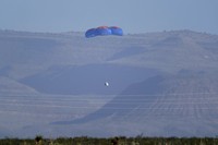 Audrey Powers, left, speaks as William Shatner, from left, Chris Boshuizen and Glen de Vries look on during a media availability at the Blue Origin spaceport near Van Horn, Texas, Wednesday, Oct. 13, 2021.  The “Star Trek” actor and the three fellow passengers hurtled to an altitude of 66.5 miles (107 kilometers) over the West Texas desert in the fully automated capsule, then safely parachuted back to Earth in a flight that lasted just over 10 minutes. (AP Photo/LM Otero)