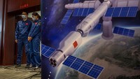 JIUQUAN, CHINA - OCTOBER 14: A worker from China Manned Space Agency watches at the spokespersons press conference on October 14, 2021 at the Jiuquan Satellite Launch Center in Jiuquan, China. The crew of the Shenzhou-13 spacecraft will be carried by a Long March-2F rocket, set to launch to the space station China is building, from the Gobi Desert on October 16 and will stay for six months, the standard for all future missions. It is the second crewed launch this year. (Photo by Kevin Frayer/Getty Images)