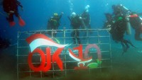 Hal itu juga dilakukan dengan pengembangan destinasi wisata bahari Sulut yang sejalan akan isu perubahan iklim global dalam rangka menyambut peringatan satu dasawarsa OJK. 