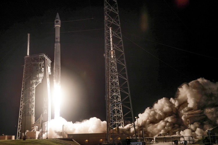 This photo released by NASA, shows a United Launch Alliance Atlas V rocket with the Lucy spacecraft aboard in this 2 minute and 30 second exposure photo as it launches from  Space Launch Complex 41, Saturday, Oct. 16, 2021, at Cape Canaveral Space Force Station in Florida. Lucy will be the first spacecraft to study Jupiters Trojan Asteroids. Like the missions namesake – the fossilized human ancestor, 