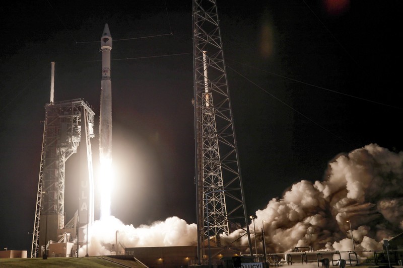 This photo released by NASA, shows a United Launch Alliance Atlas V rocket with the Lucy spacecraft aboard in this 2 minute and 30 second exposure photo as it launches from  Space Launch Complex 41, Saturday, Oct. 16, 2021, at Cape Canaveral Space Force Station in Florida. Lucy will be the first spacecraft to study Jupiter's Trojan Asteroids. Like the mission's namesake – the fossilized human ancestor, 