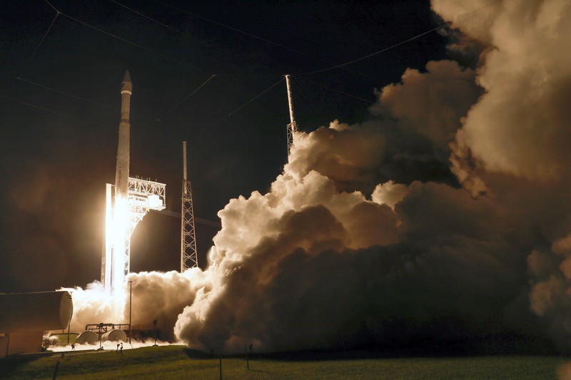 This photo released by NASA, shows a United Launch Alliance Atlas V rocket with the Lucy spacecraft aboard in this 2 minute and 30 second exposure photo as it launches from  Space Launch Complex 41, Saturday, Oct. 16, 2021, at Cape Canaveral Space Force Station in Florida. Lucy will be the first spacecraft to study Jupiter's Trojan Asteroids. Like the mission's namesake – the fossilized human ancestor, 