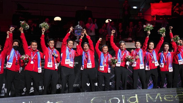 Players from Indonesia celebrates after winning the Thomas Cup mens team badminton tournament in Aarhus, Denmark, Sunday Oct. 17, 2021. (Claus Fisker/Ritzau Scanpix via AP)