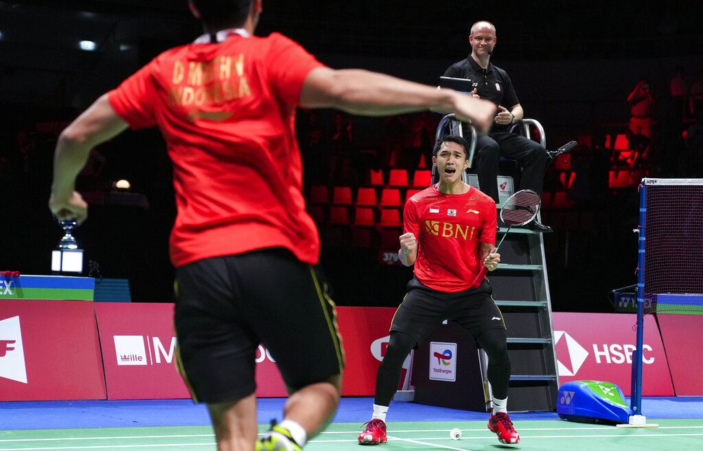 Indonesia's Jonatan Christie celebrates after winning the men's single match in the Thomas Cup mens team final match between China and Indonesia, in Aarhus, Denmark, Sunday Oct. 17, 2021. (Claus Fisker/Ritzau Scanpix via AP)