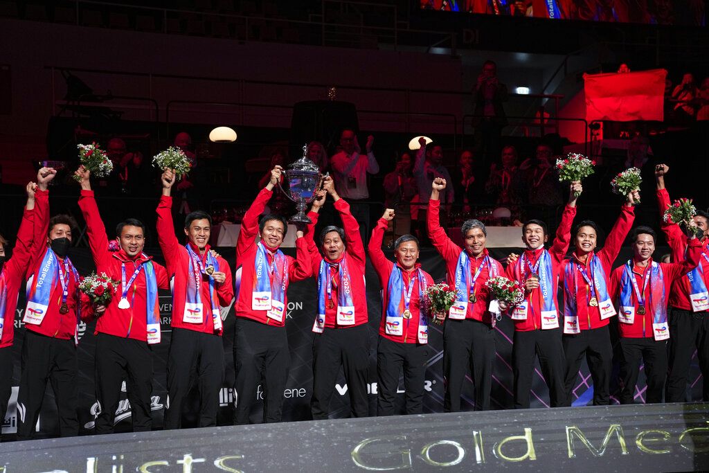 Players from Indonesia celebrates after winning the Thomas Cup men's team badminton tournament in Aarhus, Denmark, Sunday Oct. 17, 2021. (Claus Fisker/Ritzau Scanpix via AP)