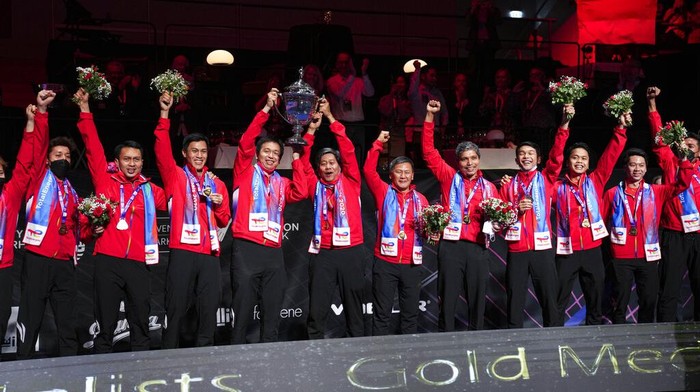 Players from Indonesia celebrates after winning the Thomas Cup mens team badminton tournament in Aarhus, Denmark, Sunday Oct. 17, 2021. (Claus Fisker/Ritzau Scanpix via AP)