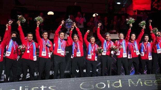 Players from Indonesia celebrates after winning the Thomas Cup men's team badminton tournament in Aarhus, Denmark, Sunday Oct. 17, 2021. (Claus Fisker/Ritzau Scanpix via AP)