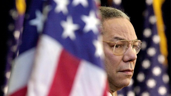 Colin Powell FILE - In this Feb. 15, 2001 file photo, Secretary of State Colin Powell looks on as President Bush addresses State Department employees at the State Department in Washington. Powell, former Joint Chiefs chairman and secretary of state, has died from COVID-19 complications. In an announcement on social media Monday, the family said Powell had been fully vaccinated. He was 84. (AP Photo/Kenneth Lambert)