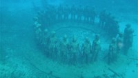 Selain surga bawah lautnya, ada satu destinasi ikonik di Grenada yaitu The Milonere. Di sana ada puluhan patung yang berada di bawah laut. (Getty Images)
