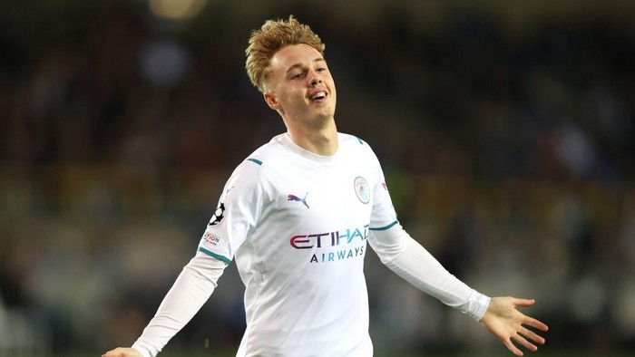 BRUGGE, BELGIUM - OCTOBER 19: Cole Palmer of Manchester City celebrates after scoring their sides fourth goal during the UEFA Champions League group A match between Club Brugge KV and Manchester City at Jan Breydel Stadium on October 19, 2021 in Brugge, Belgium. (Photo by Julian Finney/Getty Images)