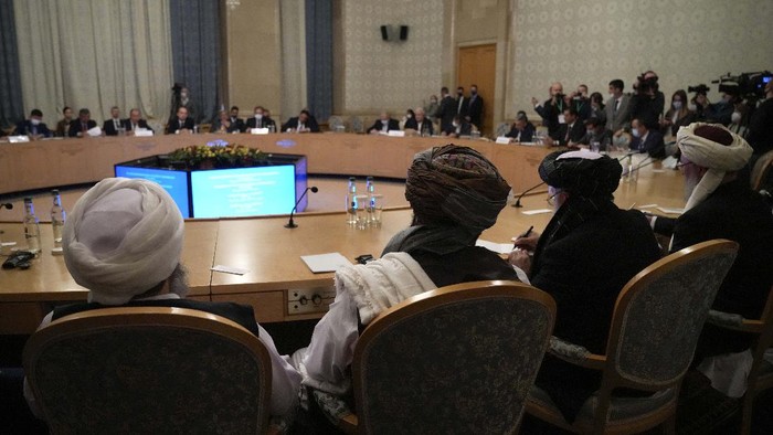Members of the political delegation from the Afghan Taliban's movement attend talks involving Afghan representatives in Moscow, Russia, Wednesday, Oct. 20, 2021. Russia invited the Taliban and other Afghan parties for talks voicing hope they will help encourage discussions and tackle Afghanistan's challenges. (AP Photo/Alexander Zemlianichenko, Pool)