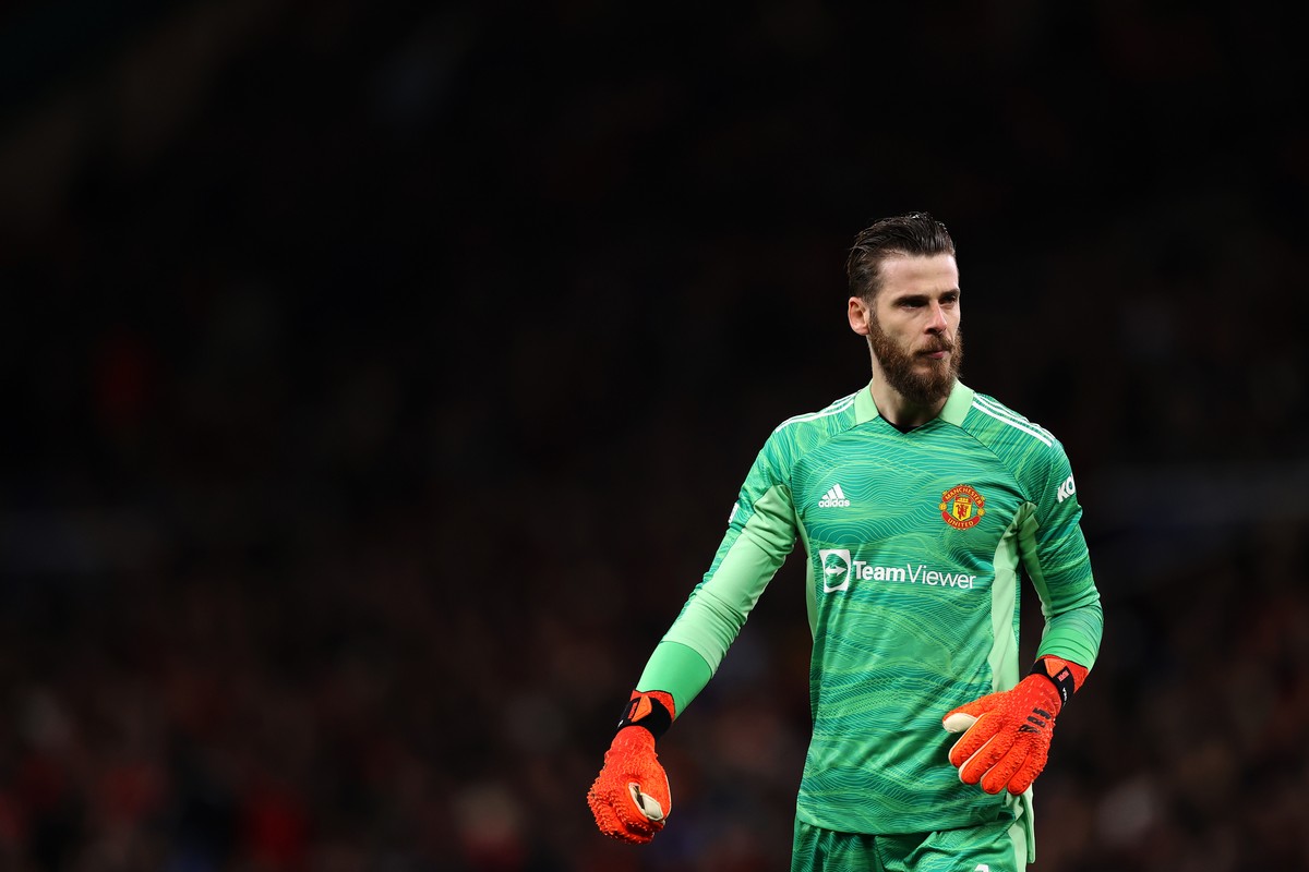 David de Gea berkelakar, Manchester United dikutuk karena lama puasa gelar juara. (Foto: Getty Images/Naomi Baker)