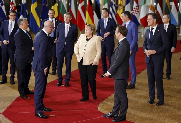 Belgium EU Summit European Union leaders gather for a round table meeting at an EU summit in Brussels, Thursday, Oct. 21, 2021. European Union leaders head into a standoff between Poland and most of the other EU member nations over the rule of law in the eastern member state. Other issues for the 27 EU leaders include climate change, the energy crisis, COVID-19 developments and migration. (John Thys, Pool Photo via AP)