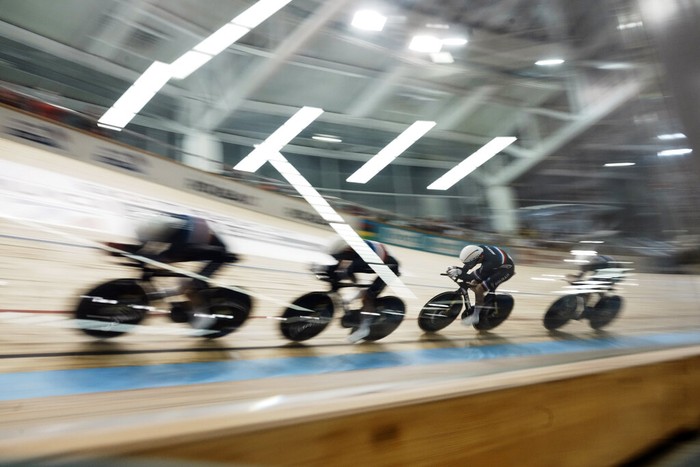 Riders of Team Italy celebrate their gold medals after winning the men's team pursuit race at the UCI Track Cycling World Championship in Roubaix, north of France, Thursday, Oct. 21, 2021. (AP Photo/Thibault Camus)