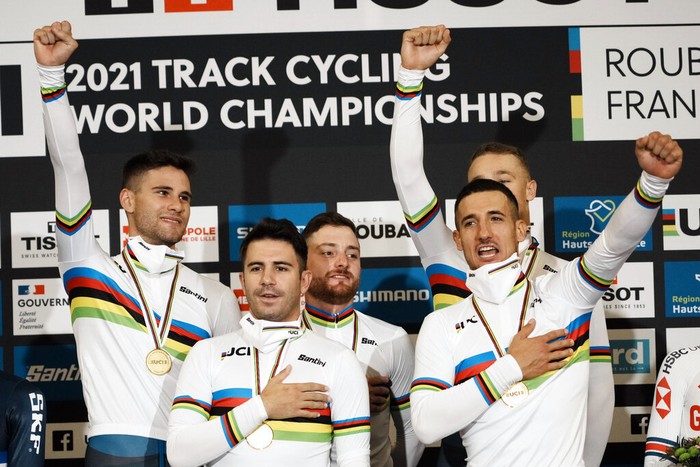 Riders of Team Italy celebrate their gold medals after winning the men's team pursuit race at the UCI Track Cycling World Championship in Roubaix, north of France, Thursday, Oct. 21, 2021. (AP Photo/Thibault Camus)
