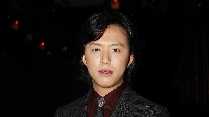 MILAN, ITALY - JANUARY 15:  Yundi Li attends the Ermenegildo Zegna show as part of Milan Fashion Week Menswear A/W 2011 on January 15, 2011 in Milan, Italy.  (Photo by Vittorio Zunino Celotto/Getty Images)
