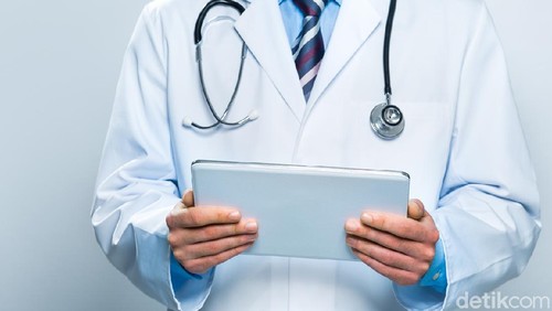 Doctor using a digital tablet. Technology and medicine concept