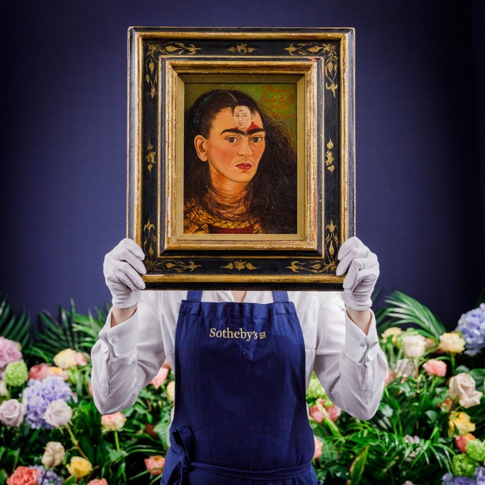 LONDON, ENGLAND - OCTOBER 21:  Frida Kahlo’s ultimate self-portrait goes on view at Sotheby's on October 21, 2021 in London, England. Estimated at over $30 million, it is expected to break the record for the artist and for any Latin American artist. This is a unique chance for British audiences to view a self-portrait by Kahlo, with none in UK institutions. The painting is on view to the public at Sotheby's London from the 22 -25 October ahead of being auctioned at Sotheby's New York on 16 November 2021.  (Photo by Tristan Fewings/Getty Images for Sotheby's)