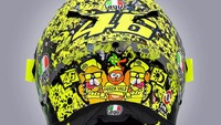 Di bagian belakang, angka 46 tercetak dengan warna kuning. Di belakang juga ada gambar dua anjing dan satu kucing peliharaan Valentino Rossi. Hewan peliharaan Rossi itu digambarkan memegang tulisan Forza Vale dan 46. Foto: MotoGP.com
