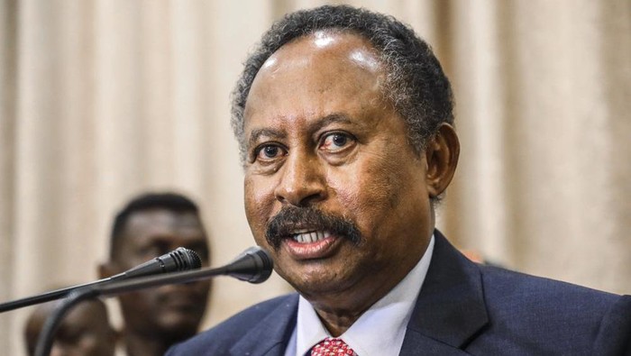 FILE - In this Wednesday, Aug. 21, 2019 file photo, Sudans Prime Minister Abdalla Hamdok speaks during a news conference in Khartoum, Sudan.Sudans information ministry says the countrys interim prime minister Hamdok and a number of senior government officials have been arrested. The ministry described ctions as a military coup, Monday, Oct 25, 2021. (AP Photo, File)