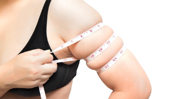 fat woman wear black underwear show fat cellulite overweight concept