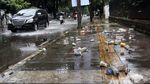 Hujan Reda, Jalan Tergenang dan Sampah Berserakan