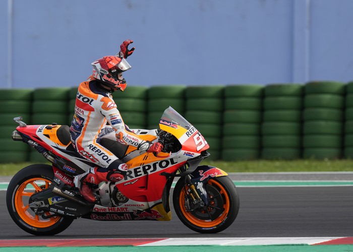 Spains rider Marc Marquez of the Repsol Honda Team celebrates after winning the MotoGP race of the Emilia Romagna Motorcycle Grand Prix at the Misano circuit in Misano Adriatico, Italy, Sunday, Oct. 24, 2021. (AP Photo/Antonio Calanni)
