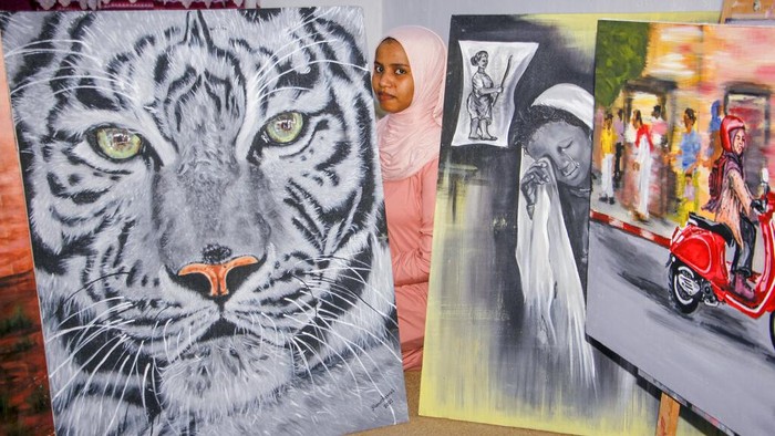 Tak banyak ditemukan seniman wanita di Somalia, Sana Ashraf Sharif jadi salah satunya. Tak cuma dobrak stigma gender, Sana pun gaungkan perdamaian dari karyanya