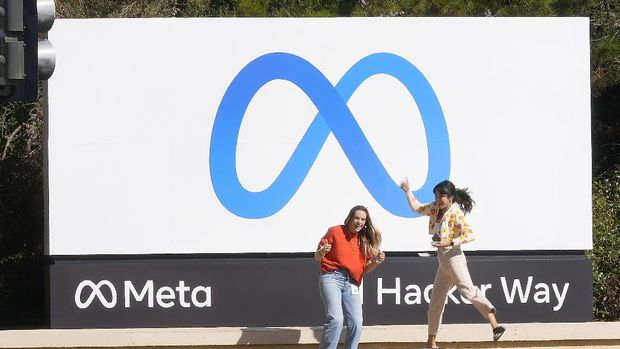 Facebook unveiled their new Meta sign at the company headquarters in Menlo Park, Calif., Thursday, Oct. 28, 2021. An embattled Facebook Inc. is changing its name to Meta Platforms Inc., or Meta for short, to reflect what CEO Mark Zuckerberg says is its commitment to developing the new surround-yourself technology known as the “metaverse.” But the social network itself will still be called Facebook. (AP Photo/Tony Avelar)