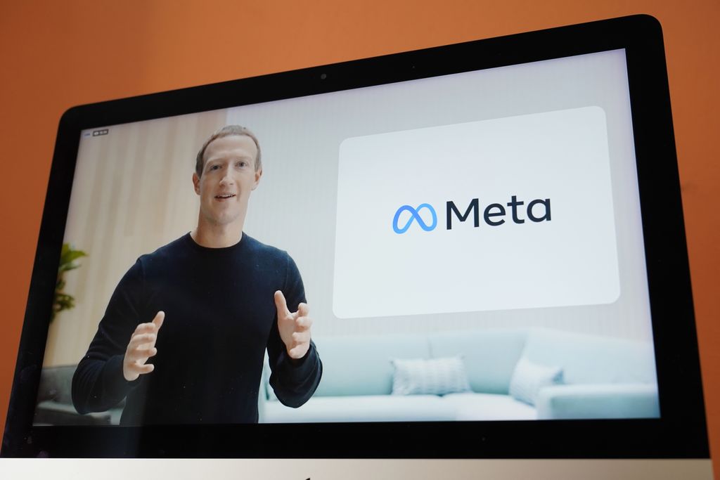 Seen on the screen of a device in Sausalito, Calif., Facebook CEO Mark Zuckerberg announces their new name, Meta, during a virtual event on Thursday, Oct. 28, 2021. Zuckerberg talked up his latest passion -- creating a virtual reality 