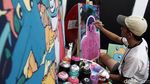 Pemuda di Bandung Ini Peringati Sumpah Pemuda dengan Melukis