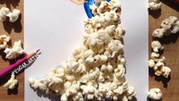 Karyanya ini menggunakan popcorn yang disematkan di bagian atas dan bawah gaun. Popcorn ini menghasilkan detail bergelombang pada gaun. Foto: Edgar Artist