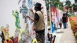 Para Seniman Kritik Polri Lewat Mural