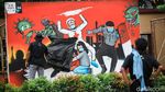 Para Seniman Kritik Polri Lewat Mural